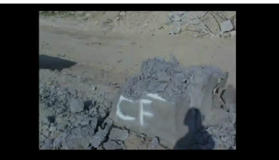 Conventional concrete cube fully destroyed by the breach charge
