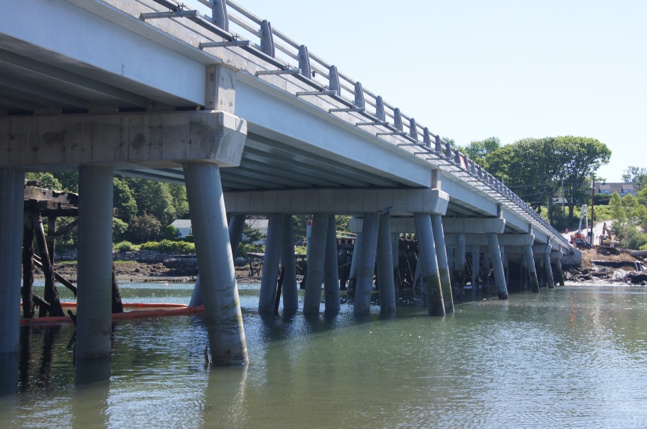 Composite bridge beam installed as a highway bridge structure